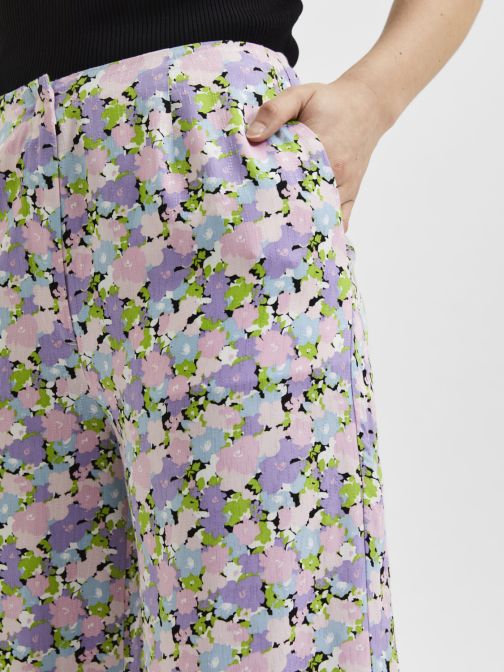 VIRÁGMINTÁS BŐ FAZONÚ NADRÁG