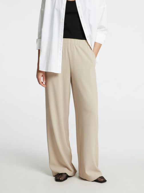 KLASSZIKUS BŐ SZÁRÚ NADRÁG